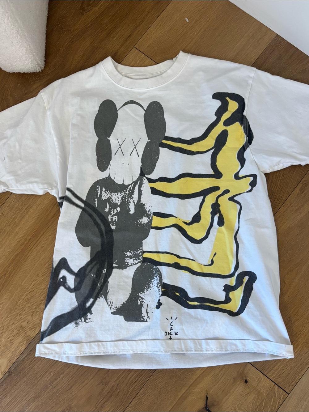 Cactus Jack by Travis Scott White Short Sleeve Tee with Black & Yellow Graphic